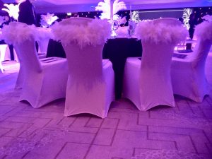 filling your space feather boas on chair covers